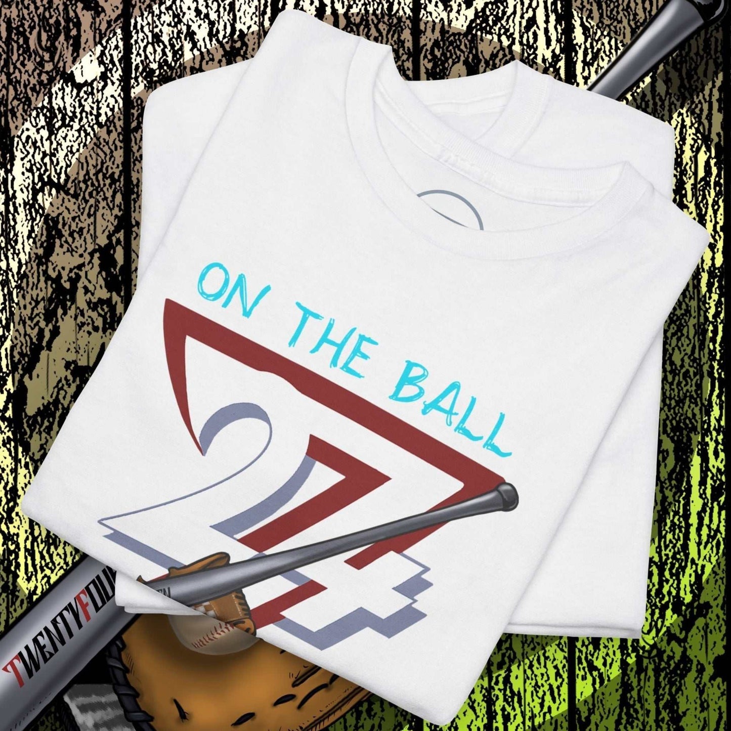 White Baseball Illustrated Tee with hand-drawn game day design, baseball glove, bat, and ball on a wooden background