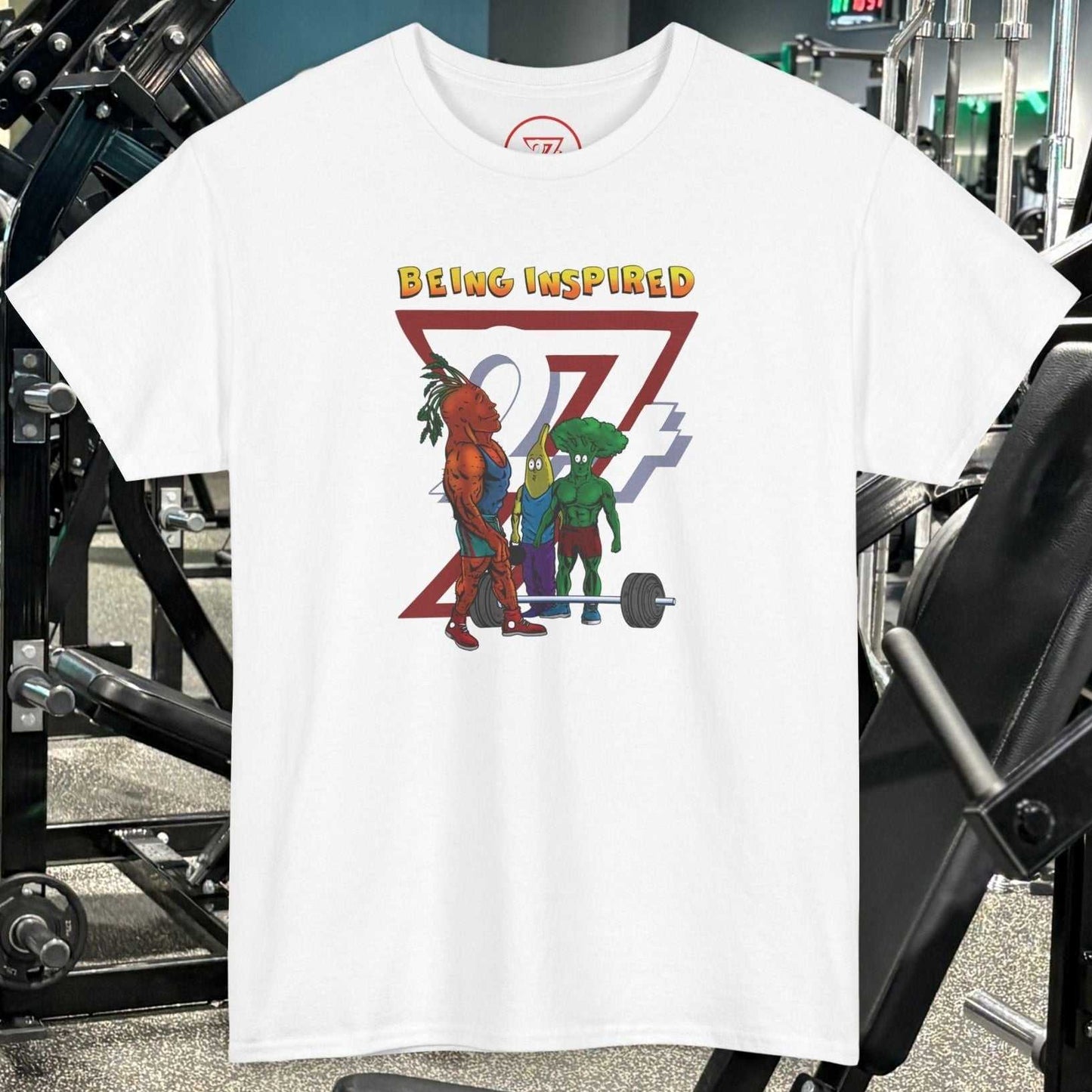 White Funny Carrot Gym Tee with cartoon carrot, banana, and broccoli lifting weights in gym setting