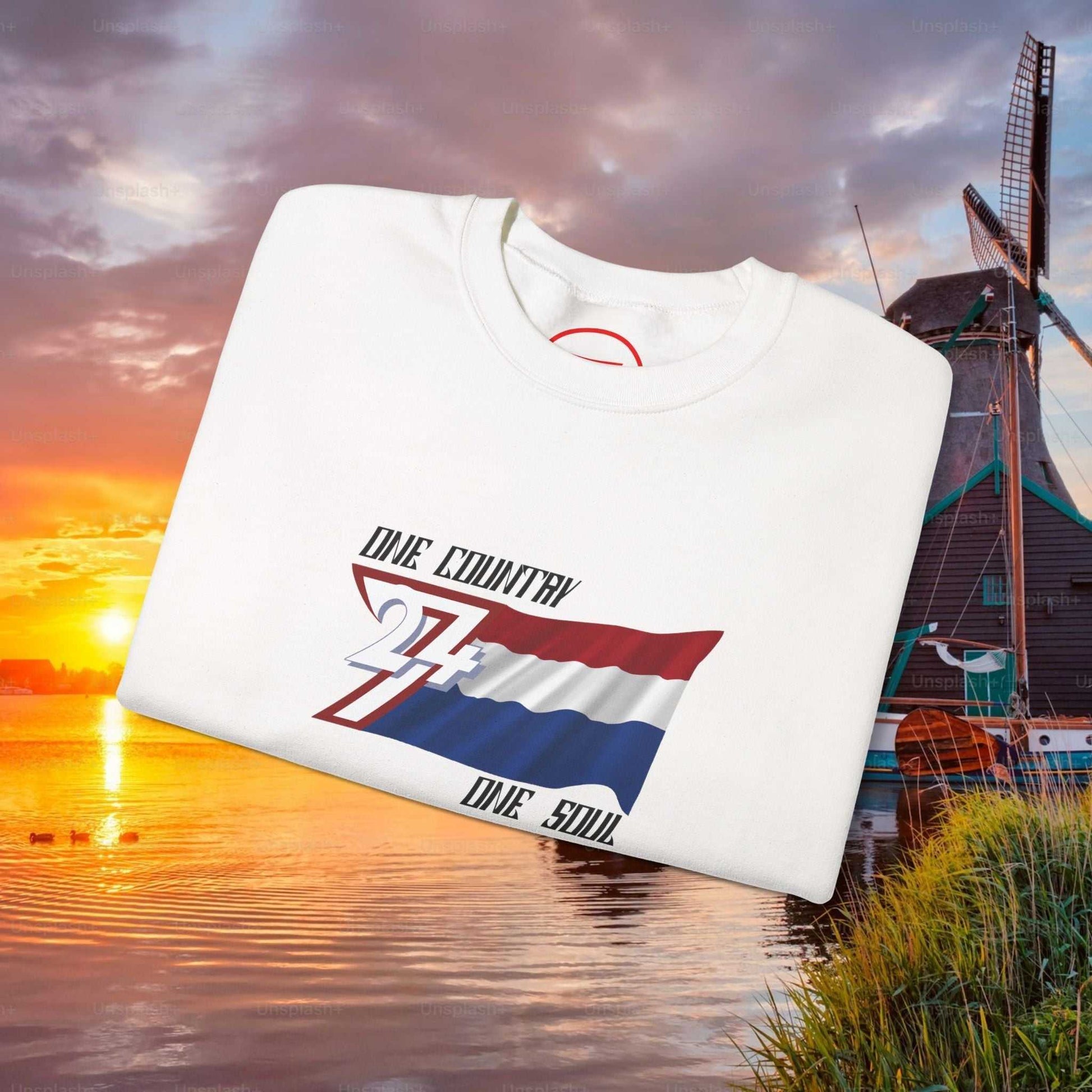 White Netherlands flag sweatshirt with hand-drawn red, white, and blue design and slogan "One Country One Soul"