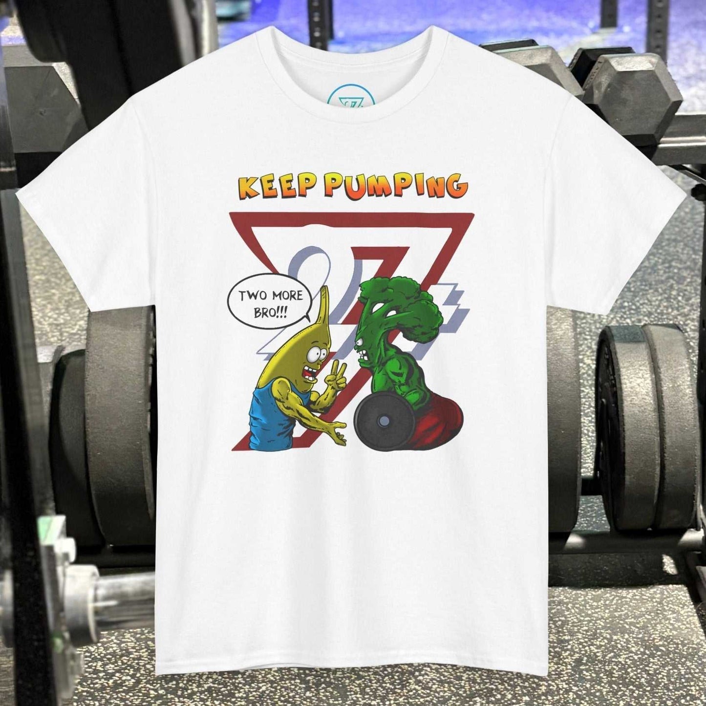 White broccoli gym tee with cartoon broccoli and banana lifting weights and text "KEEP PUMPING"