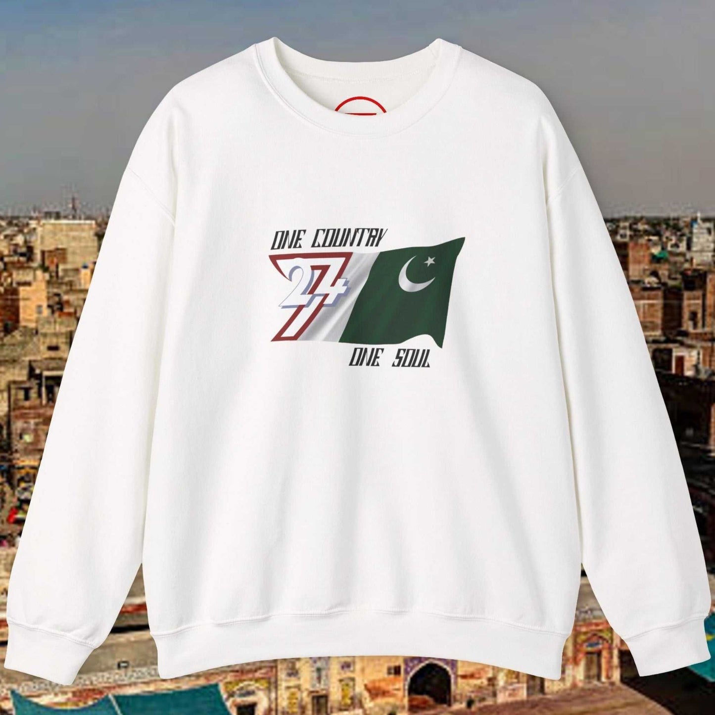 White crewneck sweatshirt with hand-drawn Pakistan flag and slogan "One Nation One Goal One Country One Soul" printed on front
