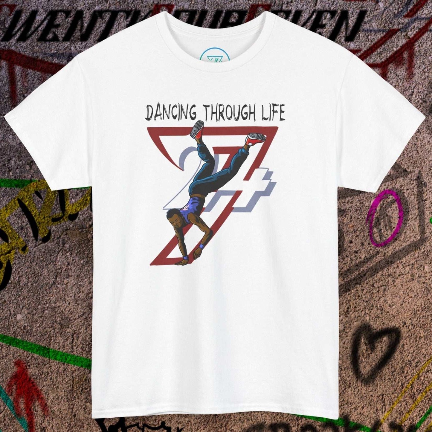 White dance tee with graphic of a hip-hop breakdancer and text "Dancing Through Life" in urban style