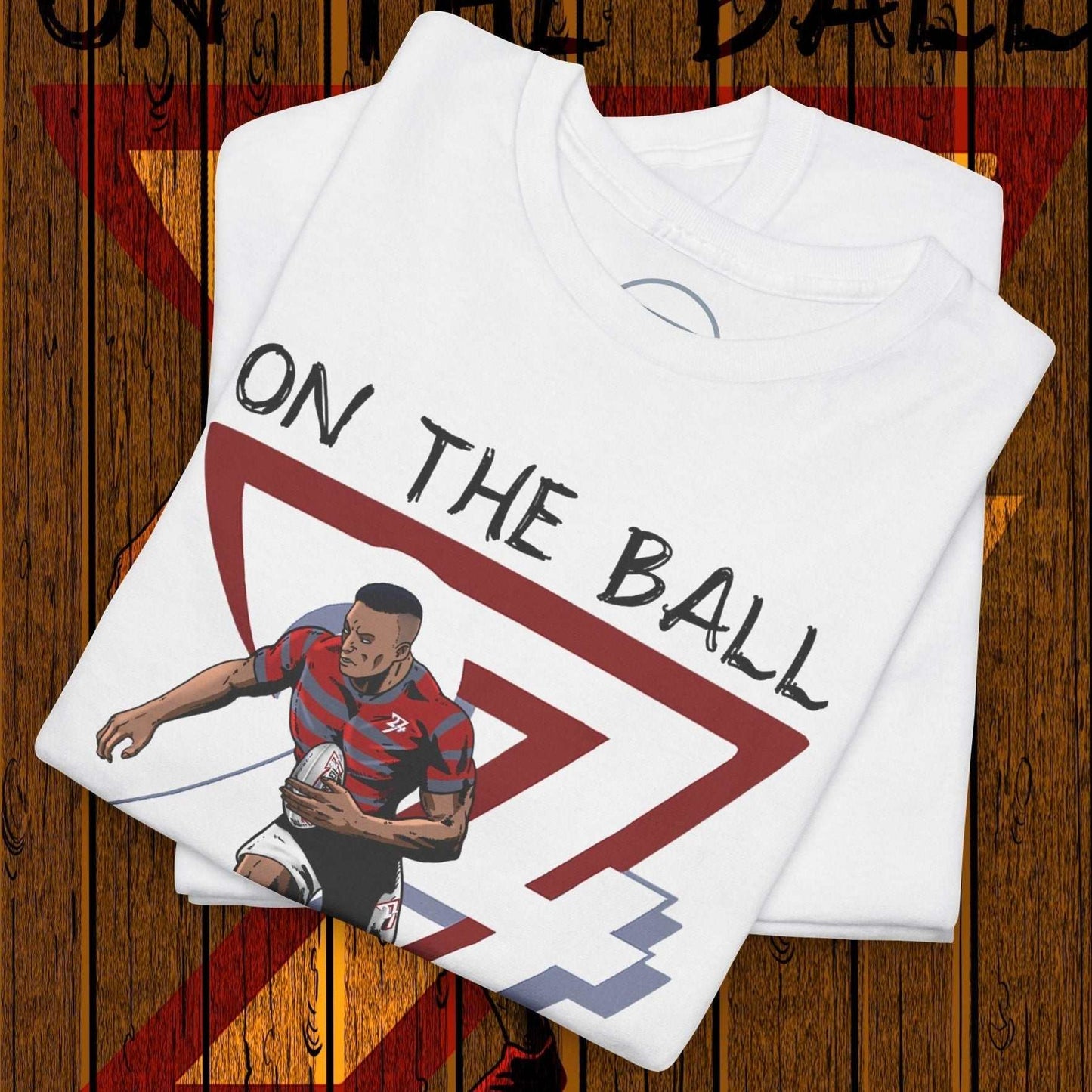 White rugby sports tee with hand-drawn rugby player illustration and "ON THE BALL" text on front