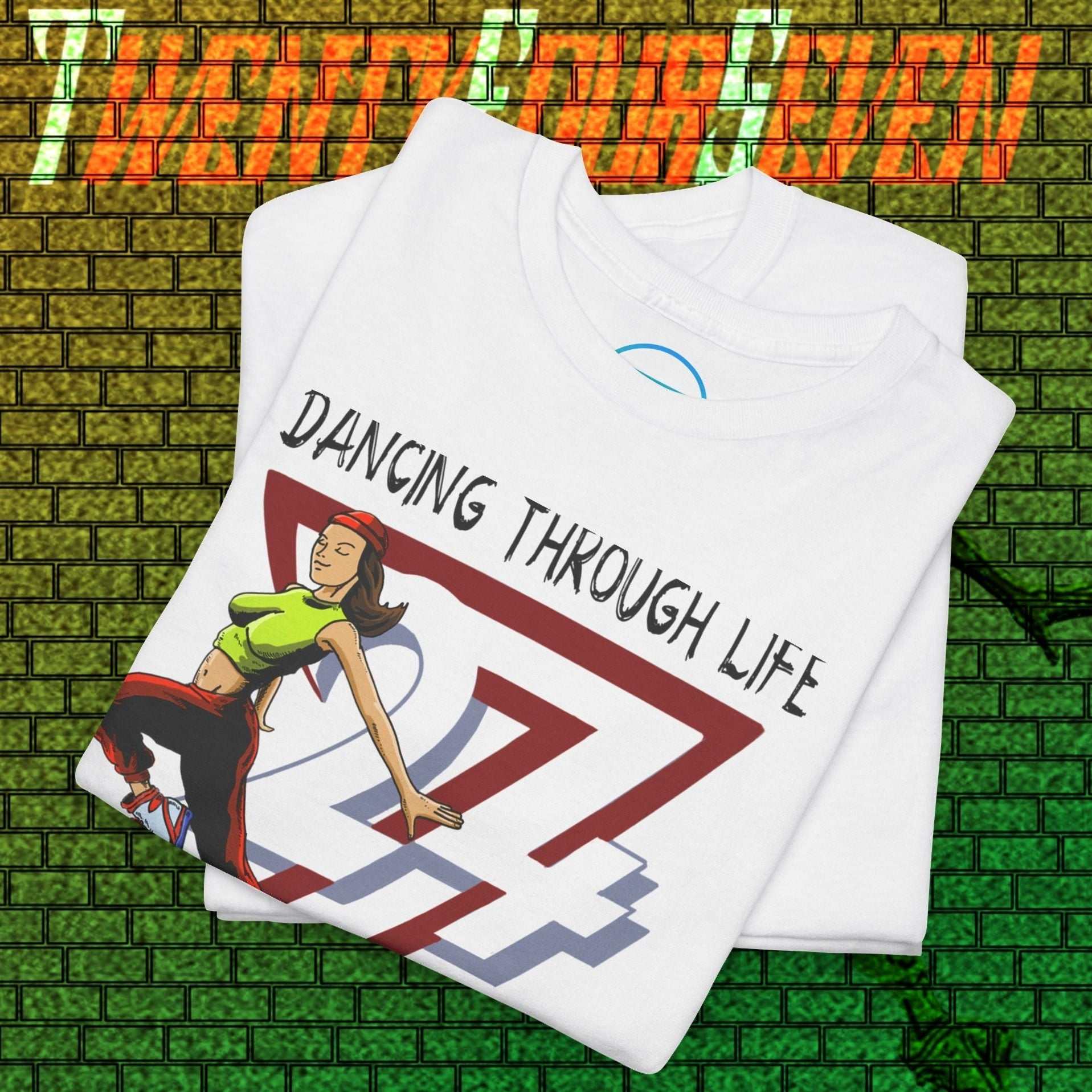 White street dance graphic tee with vibrant hand-drawn dancer illustration and "Dancing Through Life" text, urban style cotton t-shirt.