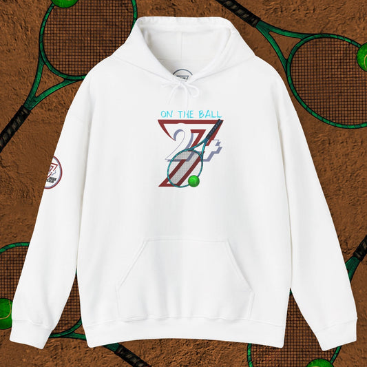 White tennis hoodie with illustrated tennis gear design and "On The Ball 24/7" text on front