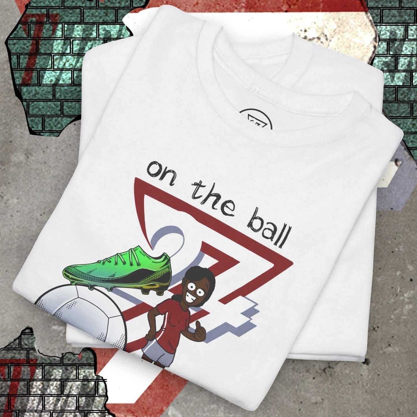 White women's football boot tee with hand-drawn soccer boot and character graphic, soft cotton fabric.