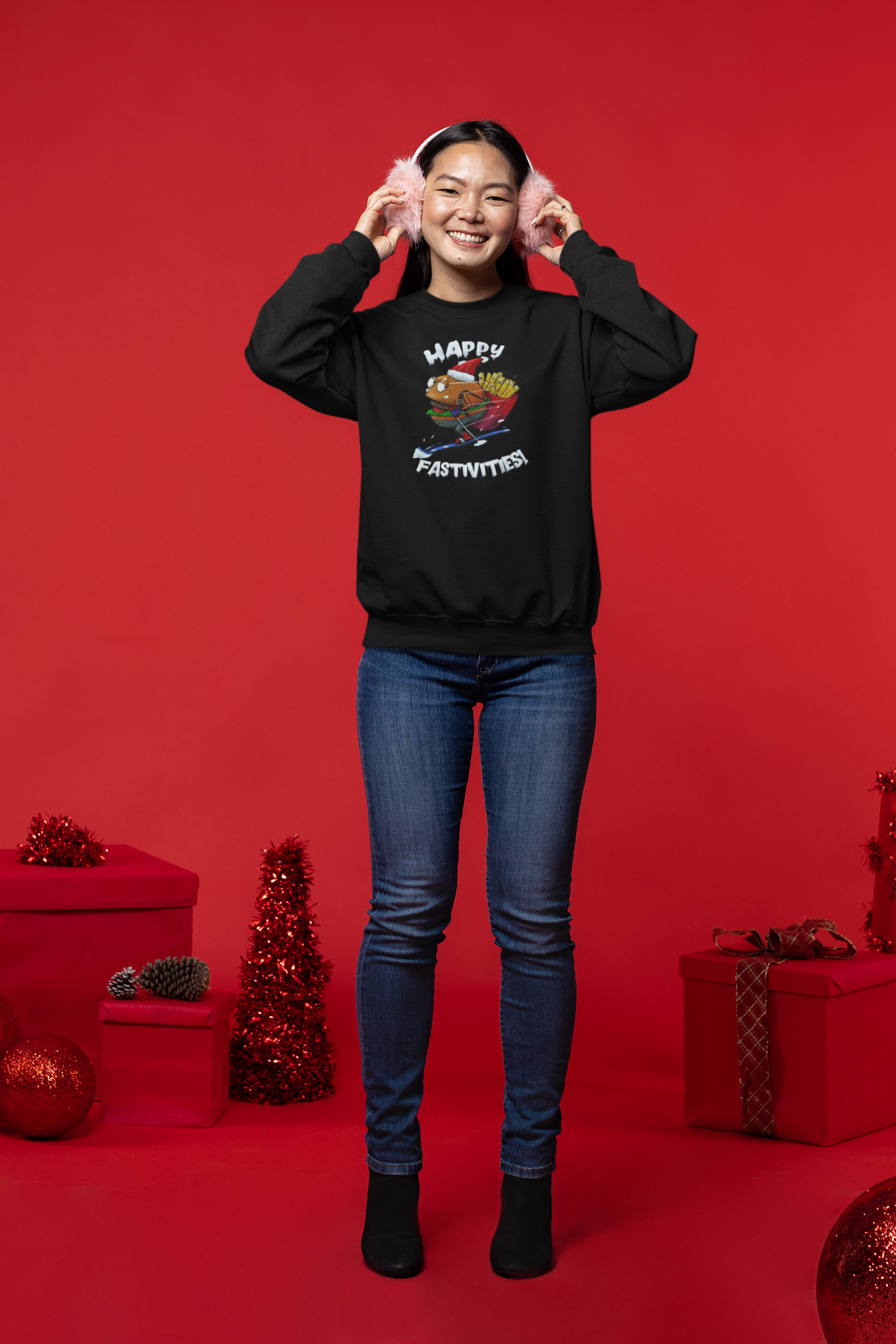 Woman wearing black Christmas burger sweatshirt with skiing Santa burger cartoon on red holiday background