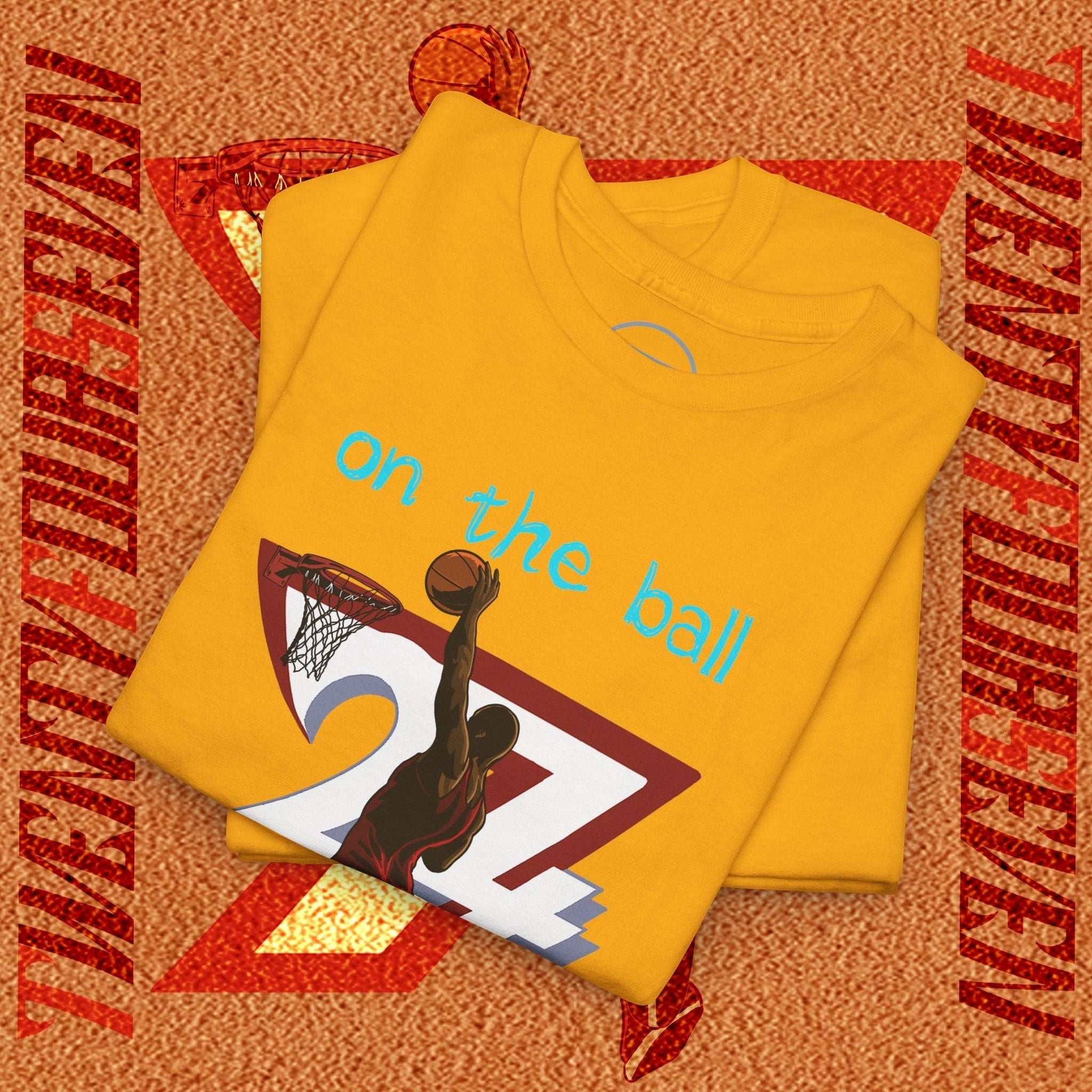Yellow 90s comic-style basketball tee with hand-drawn player graphic and "on the ball" text
