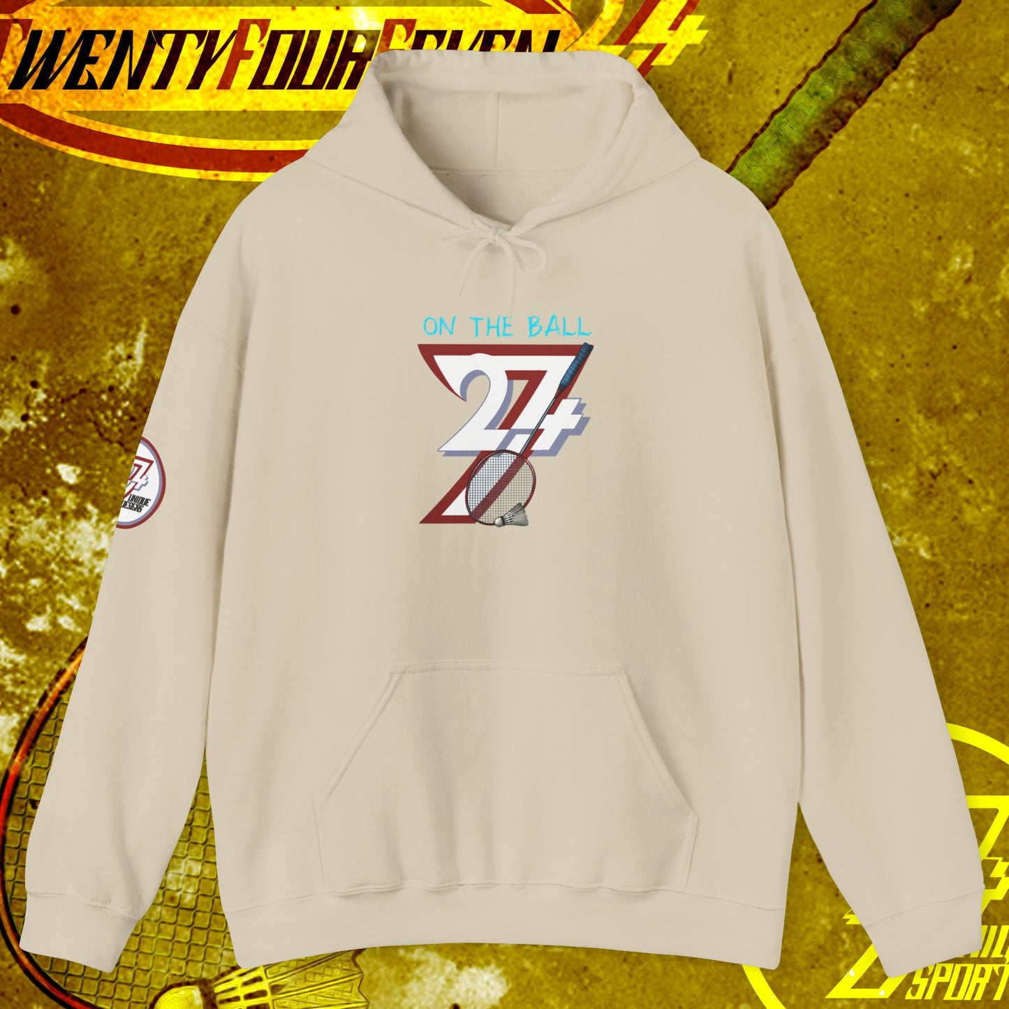 beige badminton hoodie sweatshirt with colorful "on the ball 24/7" design, kangaroo pocket, adjustable drawstring hood, outdoor sports theme
