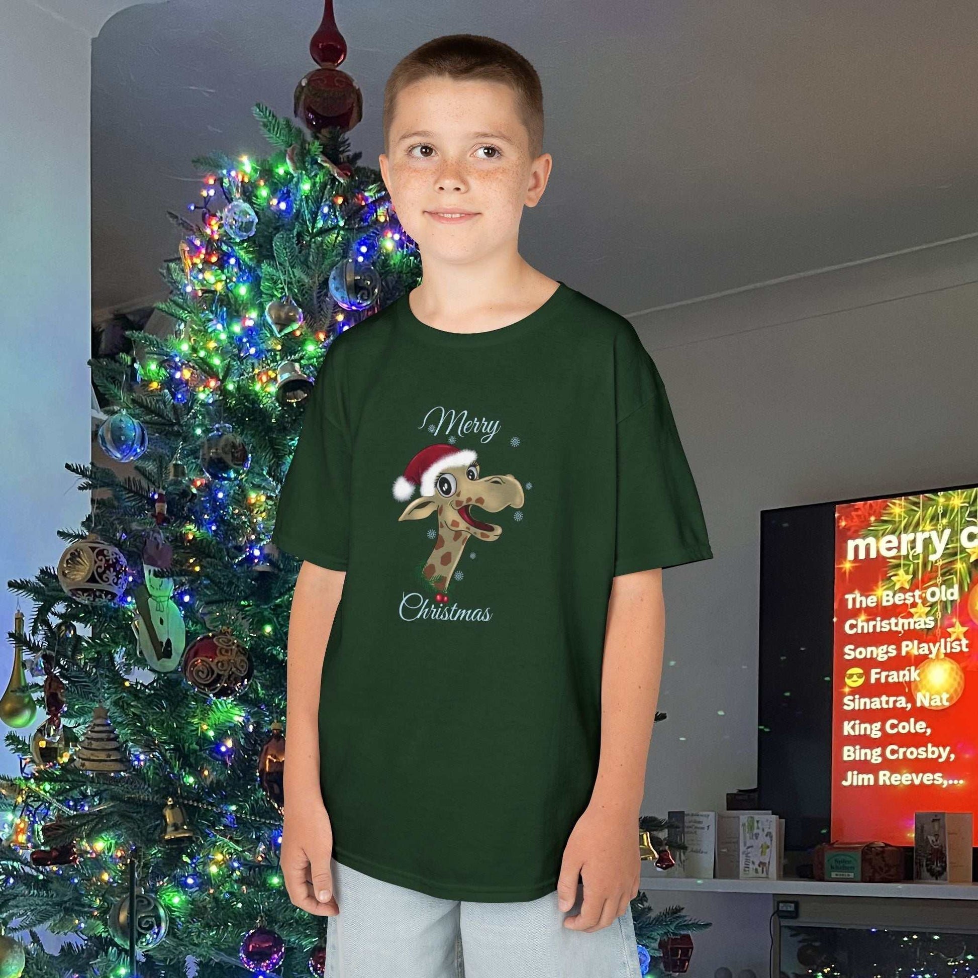 Young boy wearing the Holiday Red Giraffe tee, showing the bright festive color and soft fit.