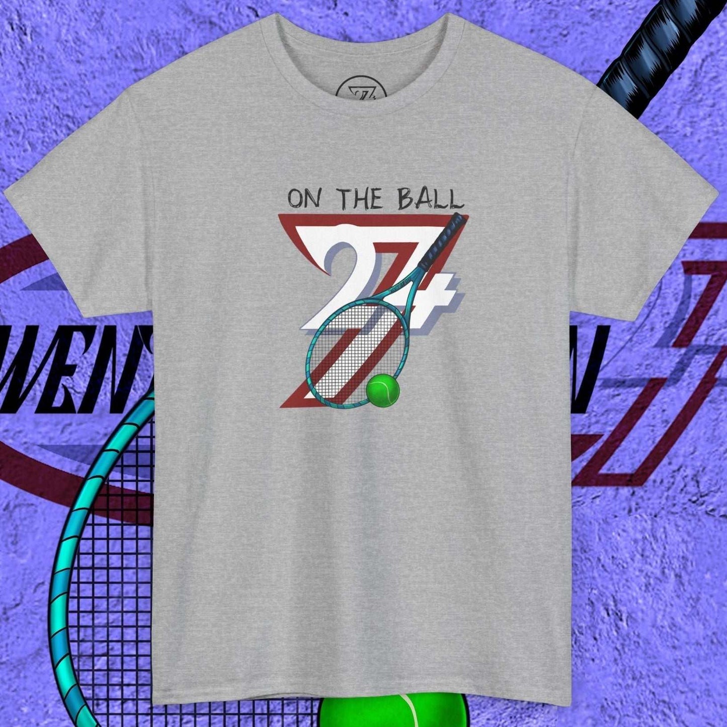 grey tennis tee with hand-drawn "On the Ball 24/7" graphic and tennis racket design