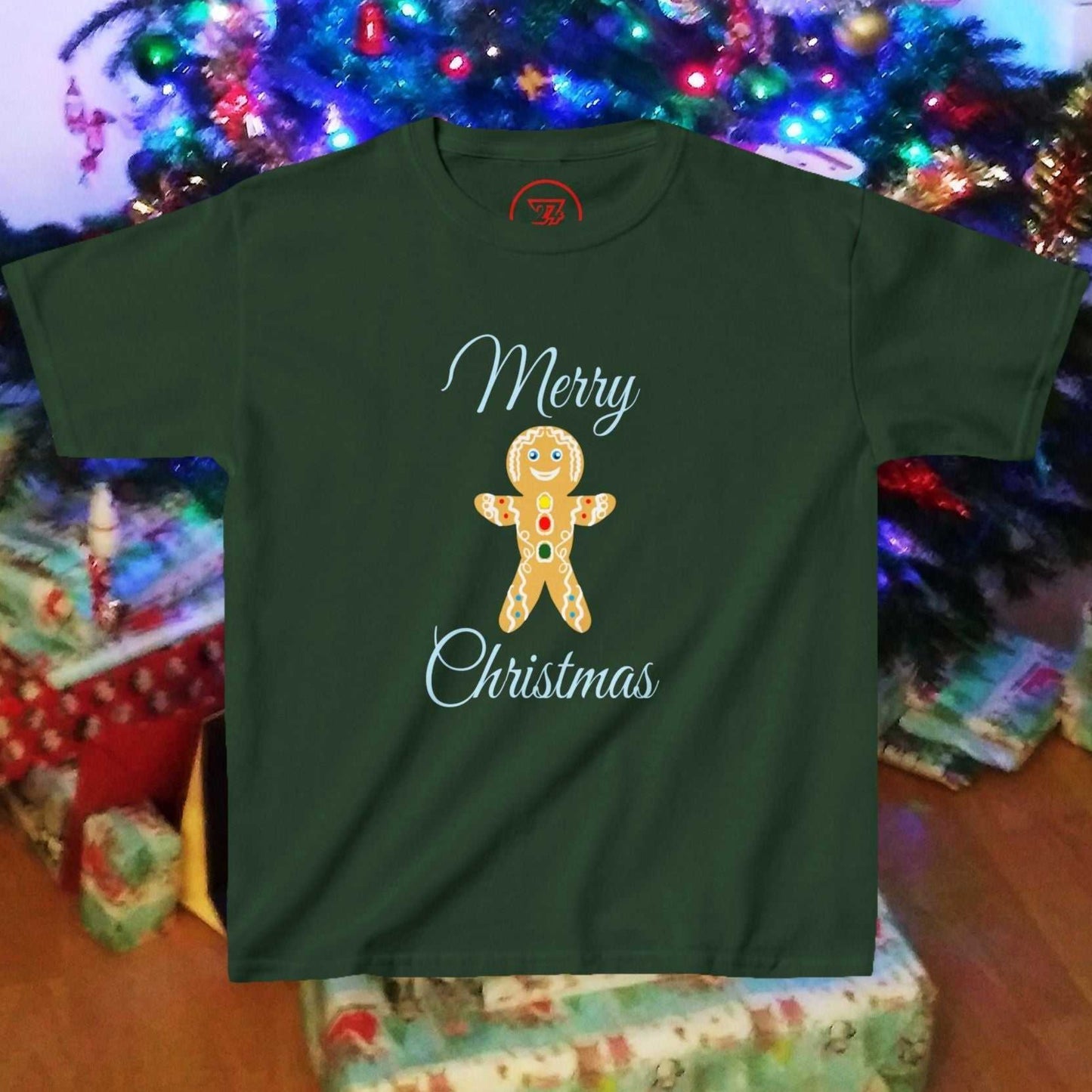 Front view of Kids Forest Green festive tee showing a hand-drawn Gingerbread Man with holiday icing details.