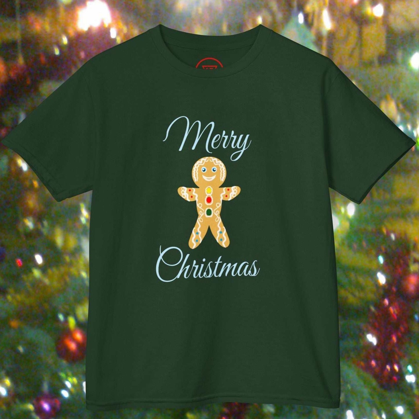 Kids Forest Green festive tee showing a hand-drawn Gingerbread Man with holiday icing details.