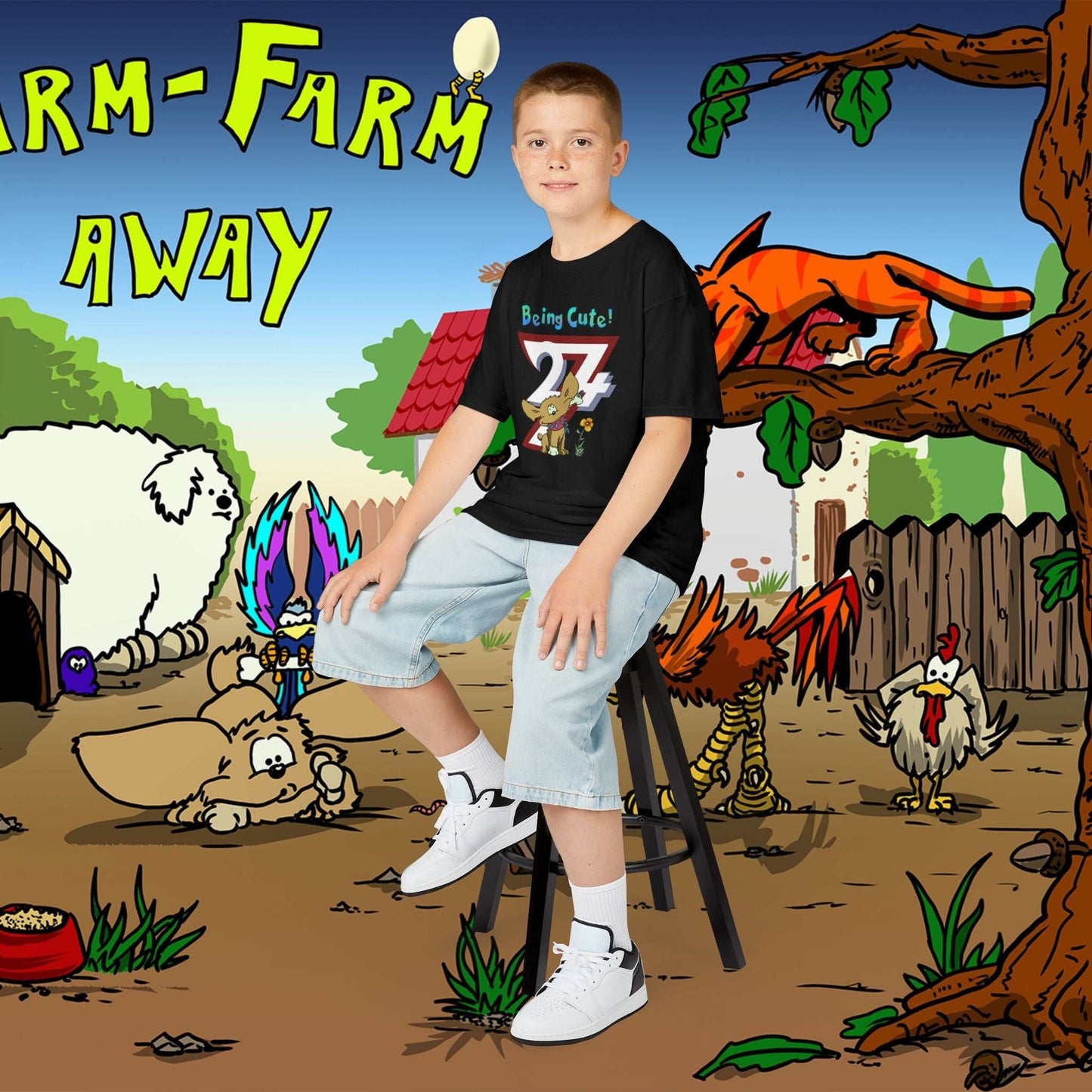 Young boy wearing the Black Cute Hand-Drawn Puppy Kids T-Shirt featuring Chomper the dog.