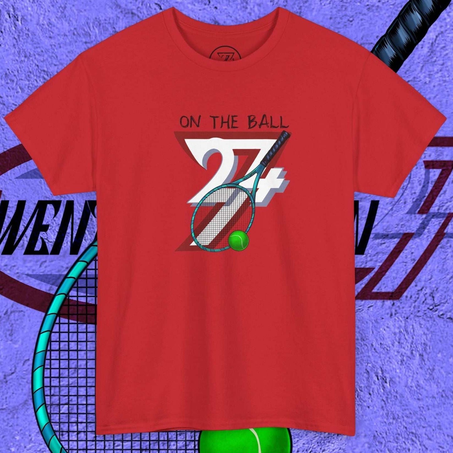 red tennis tee with hand-drawn "On the Ball 24/7" graphic featuring tennis racquet and ball