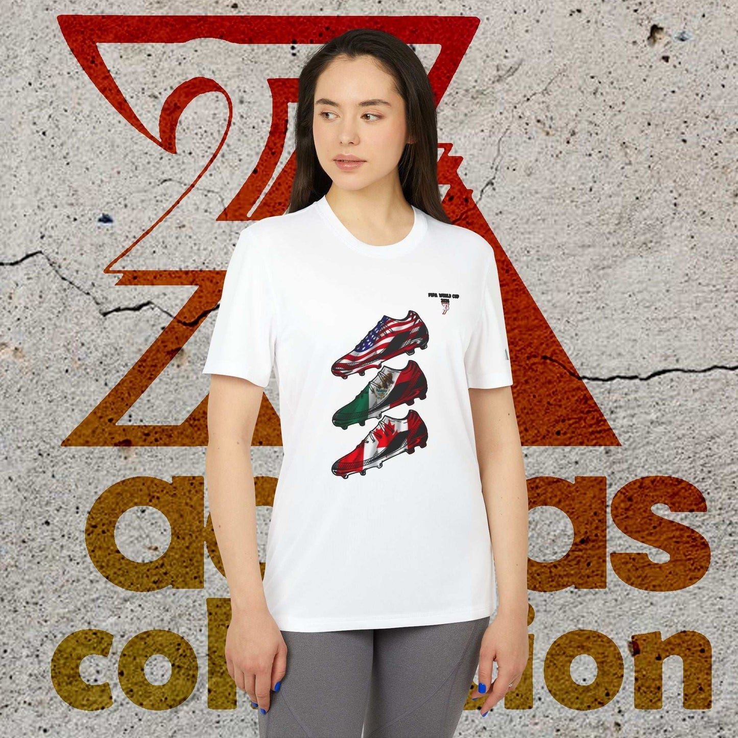 Female model styled in the White 2026 World Cup Adidas shirt, highlighting the high-definition flag boot graphic and the signature 24/7 passion sleeve trademark.