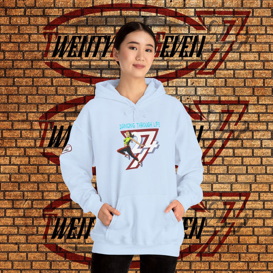 woman wearing cool urban street dance hoodie with hand-drawn illustration and kangaroo pocket against brick wall